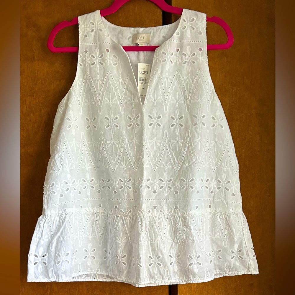 LOFT white eyelet peplum blouse. Size M